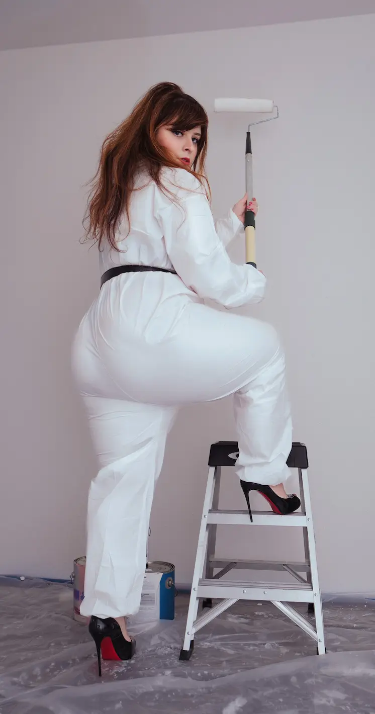 bea york painting a white wall