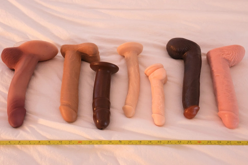 row of dildos in a variety of human skin tones